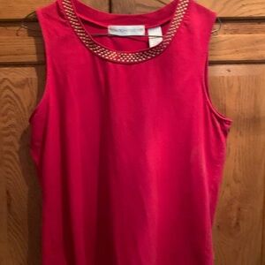 red sleeve less top with gold   beads around neck
